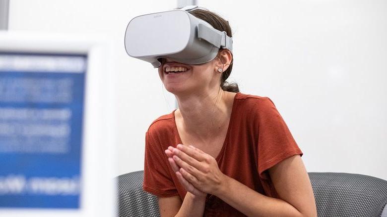 Female wearing virtual reality headset