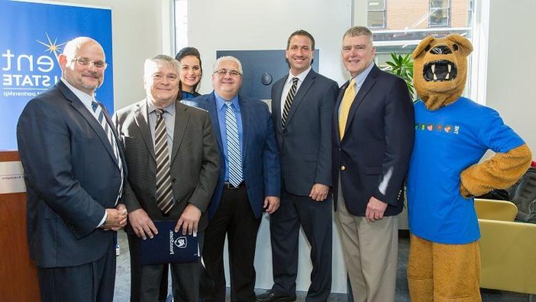 Penn State President Dr. Eric Barron is joined by Westmoreland County and New Kensington leadership for the opening of The Corner.